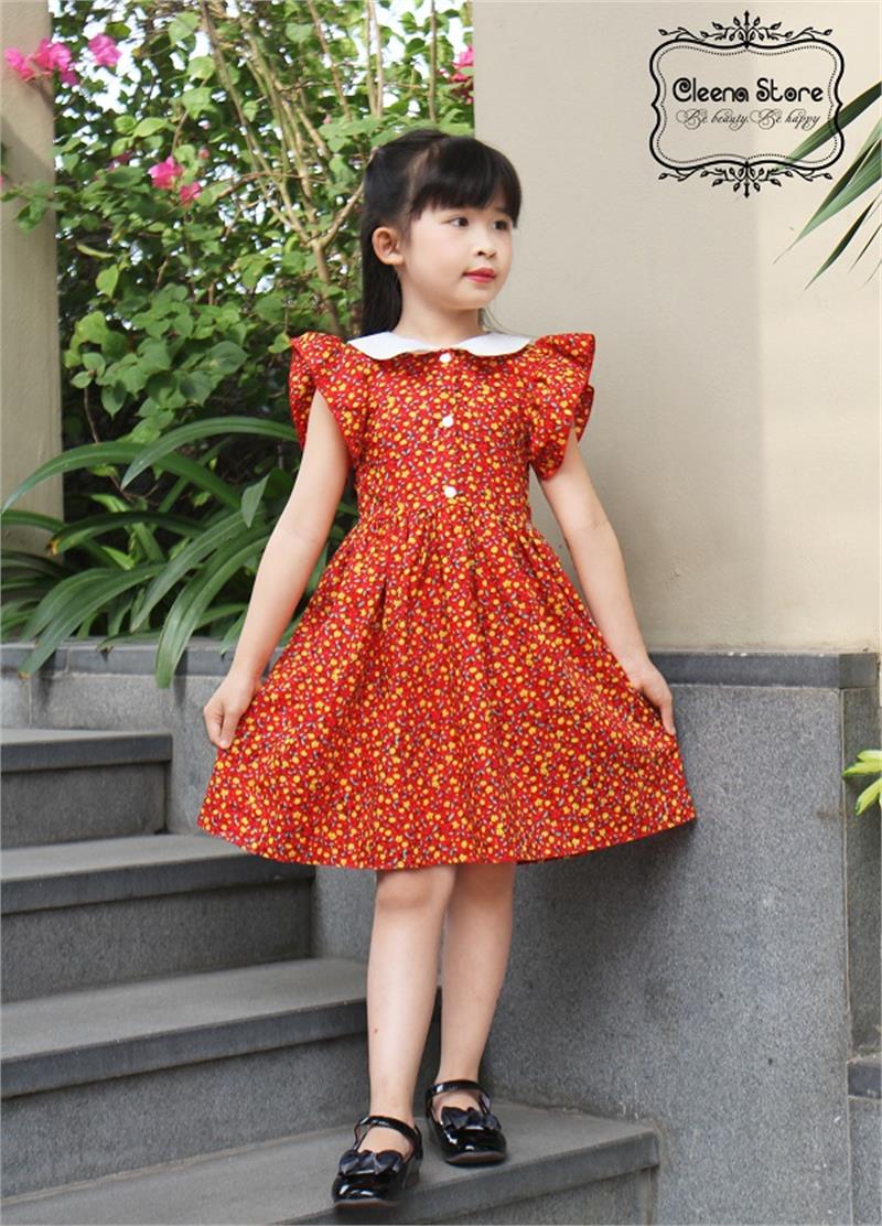 Váy xòe cổ đức dập cúc hoa nhí nền đỏ