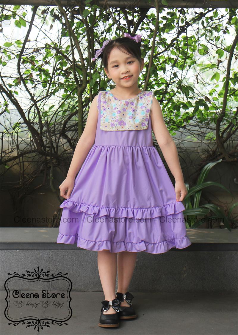 Đầm xòe sát nách phối tà vuông màu tím