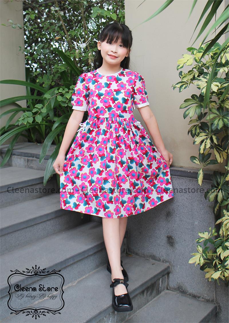Đầm xòe đính 2 nơ trắng hoa tím hồng