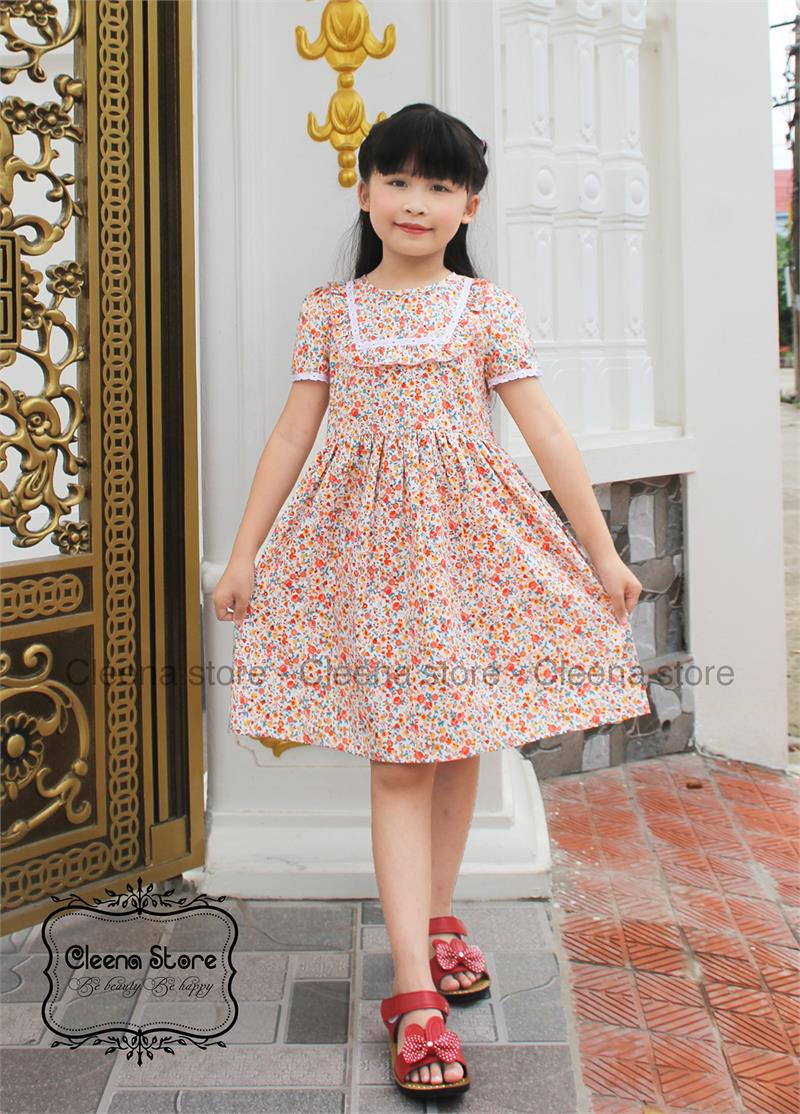 Đầm xòe viền ren vuông hoa nhí đỏ vàng