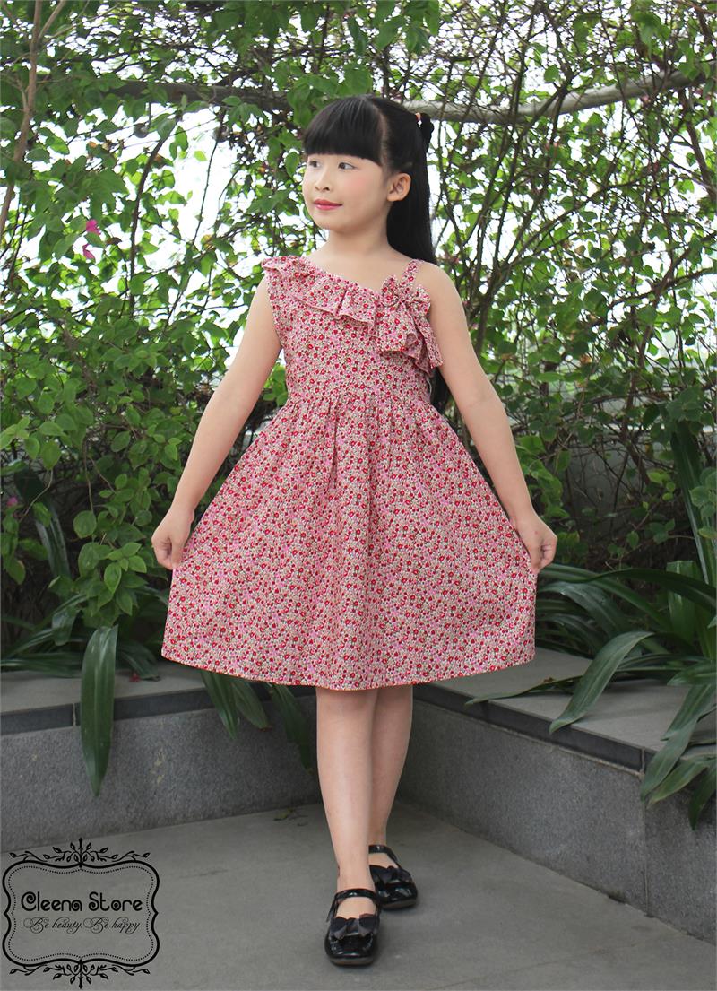 Đầm xòe lệch vai đính nơ hoa nhí đỏ hồng