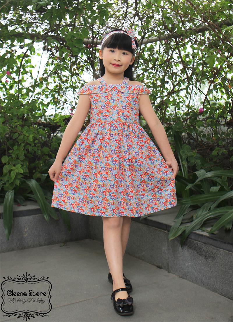 Đầm xòe hở vai 2 dây hoa cam xanh