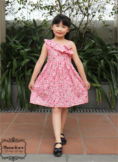 Đầm xòe lệch vai đính nơ hoa trắng nền hồng