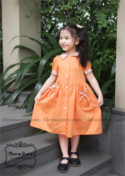 Đầm màu cam mở cúc phối hai túi